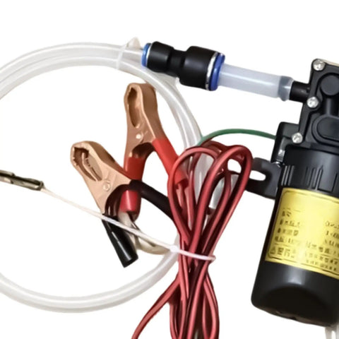 Heavy Duty 12V Self Priming Transfer Oil Pump For Garage And Shop Fluid Extractor with clamps and tubing.