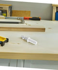 Close-up of a silver metal pivot hinge pin with a white plastic spacer for bifold closet door hardware.