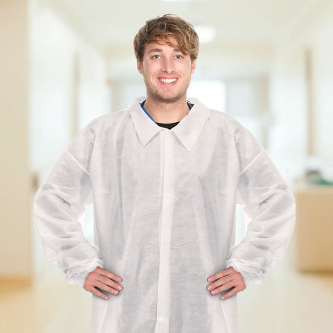 Man wearing 50 Pack Disposable Lab Coats For Adults White Large Bulk With Knitted Cuffs And Collar Ideal For Science Labs Medical Testing