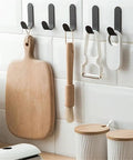 Heavy Duty Peel And Stick Wall Hooks Stainless Steel Coat Rack For Home Entryway with wooden utensils and gadgets