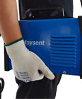 Close-up of a person holding a blue 200A Portable MMA Stick Welder 110V Inverter with Digital Display and strap