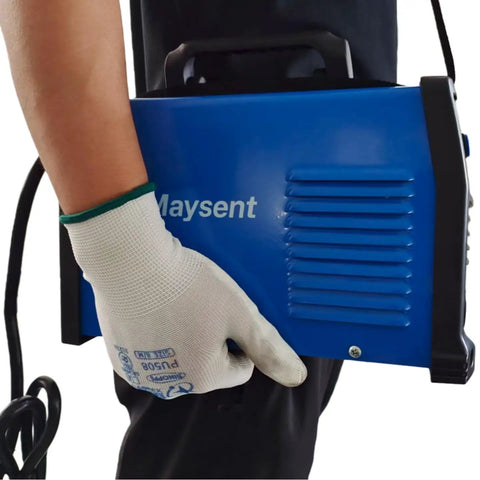 Close-up of a person holding a blue 200A Portable MMA Stick Welder 110V Inverter with Digital Display and strap