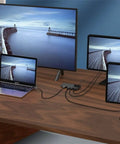 Sleek Usb C Docking Station For Triple Monitors With Usb 3.0 Ports And Dual Card Slots In Heavy Duty Aluminum Build connected to laptop and displays.