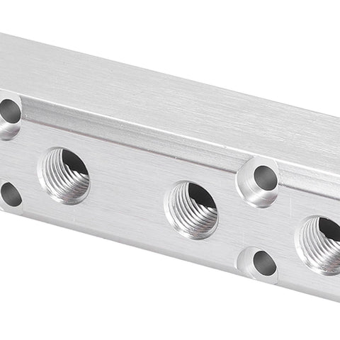 Heavy Duty Aluminum Pneumatic Manifold Block With G1/2 Inlet And G1/4 Outlet, close-up of aluminum construction and threaded outlets.