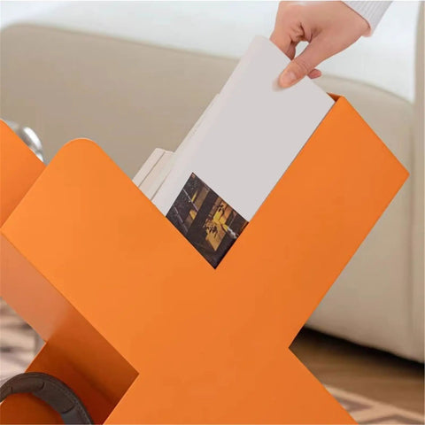 Close-up of Dope Geometric Iron Floor Bookshelf With Nordic Vibe, holding books, multi angle orange metal organizer for living room.