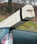 One Wrap Tape Three Quarter Inch By Twenty Five Yard Double Sided Self Gripping Roll securing wooden planks in truck