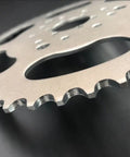 Close-up of High Performance 56 Tooth Chain Sprocket With Three Hole Six Hole Nine Pattern For 415 And 415H Chain On Gas Motorized Bicycle