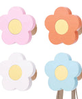 Four Pack Hand Carved Wood Daisy Wall Hooks Decorative Multi Color Coat And Robe Hanger Rack For Bathroom Kitchen Nursery Bright Vintage Refresh Game Changer with pink, orange, blue, and white flower designs.