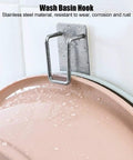Rock Solid Stainless Steel Bathroom Hook With Tight Suction Mount For Hanging Towels And Scrub Brushes Heavy Duty Wall Organizer No Fuss Setup Dependable Grip For Daily Household Use, mounted on a wet basin.