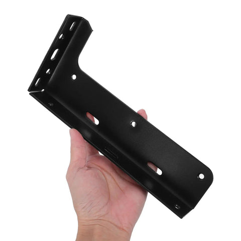 Hand holding Beefy Heavy Duty Black Steel Shelf Brackets for Wall Mounted Cabinets with Thick L Shaped Design and Hidden Invisible Supports