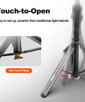 Auto Open 83.4 Inch Light Stand with Quick Release Ball Head demonstrating touch-to-open feature and stability on floor.