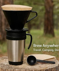 Outdoor setup of Single Cup Pour Over Coffee Dripper With Scoop And Ten Filters, Cone Size Two Manual Brewer on a mug