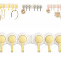 Six Hook Wall Rack Swivels 180 Degrees For Home Use No Hangups Peel Mount, displays hooks holding various items, with cheerful yellow trim.