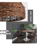 Close-up of Cozy Vibe Rattan Pendant Light Fixture With Beach Wicker Dome Shade and dining room setting in natural brown.