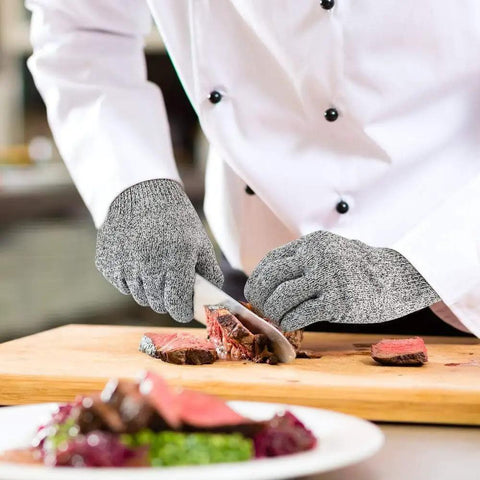 Chef using 4 Pack Cut Resistant Gloves Level 5 Protection For Kitchen Prep And Food Handling, Anti Cut Safety For Meat Cutting, Sizes Medium and Large