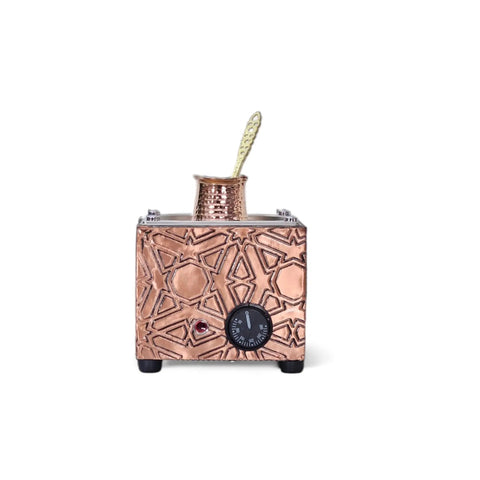 Copper Turkish Sand Heating Coffee Maker with Square Geometric Design showing its front view with an electric control knob.