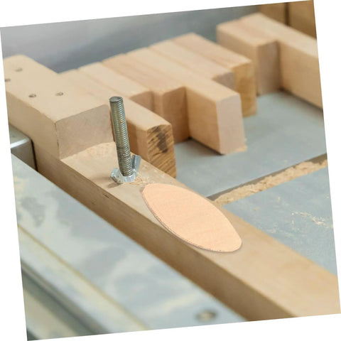 Quality Wood Biscuit Joiner Plates For Sturdy Furniture Assembly Heavy Duty Slotting Blocks on woodworking table with hardware.