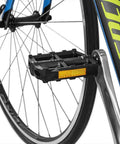 Close-up of a bike pedal on a bicycle with Two Set 9/16 Inch Bike Pedals Non Slip Lightweight Durable For Most Adult Bikes And MTBs Ready For City Cruising And Mountain Trails Comfortable Grip And Smooth Spin With EPB Bearing System