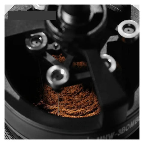 Level Up Your Home Barista Setup With This Dope 58Mm Espresso WDT Tool Featuring Six Heat Resistant Needles Adjustable Depth Control And Hidden Magnetic Storage For Zero Fuss Morning Routines, close-up of coffee grounds in grinder.
