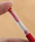 Close-up of a Beekeeping Grafting Tools Kit 10 Pack Retractable Needles For Beehive Queen Larva Rearing held by hand