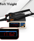 Gravel Front Fork With Air Suspension Built For Rough Gravel Trails, 40mm Travel, shown on a scale displaying weight.