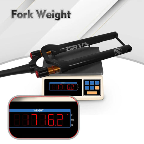 Gravel Front Fork With Air Suspension Built For Rough Gravel Trails, 40mm Travel, shown on a scale displaying weight.