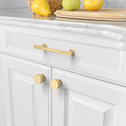 10 Pack 3 Inch Brushed Gold Cabinet Handles Modern Kitchen Drawer Pulls Heavy Duty Metal Hardware With A Knockout Finish Straight Up Premium Quality For Renovations And Remodels on white cabinetry with fruits.