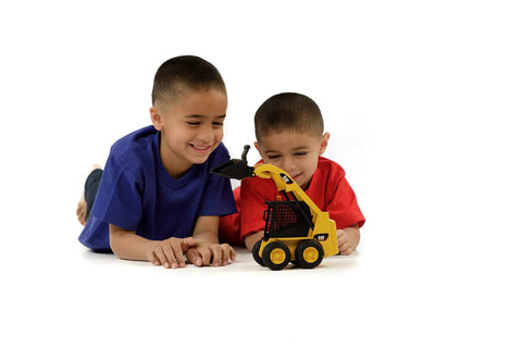 Children playing with Cat Skid Steer Loader Toy With Ultra Realistic Detail And Fully Functional Loading Arm For An Awesome Realistic Play