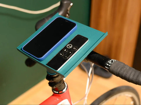 Indoor Bike Trainer Tray With Adjustable Handlebar Mount For Phone Tablet And Snacks Sleek ABS Accessory Holder, black, on bike.