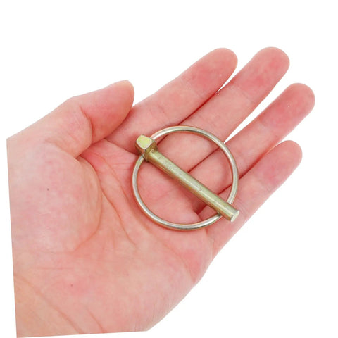 8 Piece Heavy Duty Lynch Pin Set With Spring Retainer Rock Solid Locking Pins For Trailers Mowers And Equipment Built To Last For Enhanced Durability And Safety Easy To Install And Keep Your Gear Locked In. metal lynch pin with spring retainer in hand