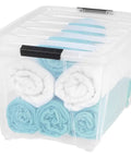 See Through 53 Quart Stackable Plastic Storage Bin With Lid For Home Organization, BPA Free, Made In USA, filled with towels
