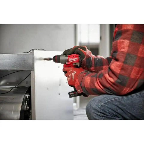M12 Fuel Cordless Hammer Drill Kit Delivering Knockout Torque And Slick Grip Handling Crushes Through Concrete And Lumber Like Badass Power Perfect For Pro Grind Days And Weekend Workshops Requiring Zero Hassle Maximum Reliability, used on a metal surface.