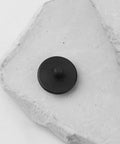 Indicator Contact Point With One Eighth Inch Shaft And One Half Inch Round Tip for Dial Indicators on white stone surface.