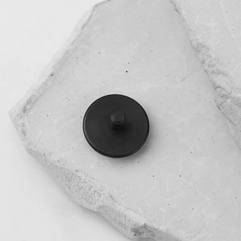 Indicator Contact Point With One Eighth Inch Shaft And One Half Inch Round Tip for Dial Indicators on white stone surface.