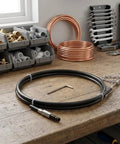 Heavy Duty Electric Drill Drain Auger Snake For Bathroom Sink And Tub Clogs Fast Hex Shank on a workbench with tools.