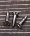 Built Like A Tank 50 Pack Flat Head Sheet Metal Screws 304 Stainless Steel Phillips Drive in a close-up view.