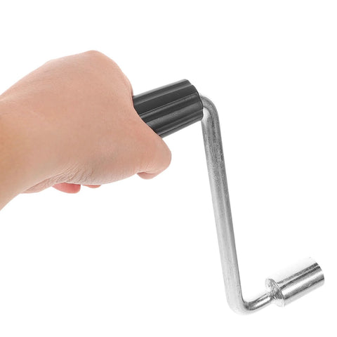 Hand holding Camper Crank Handle Replacement For RV Trailer Jack Sockets Hand Crank Rocker, durable and easy install.