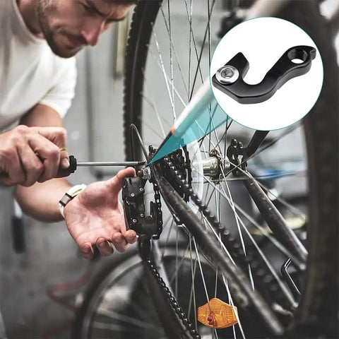Mechanic installing Universal Bicycle Derailleur Hanger With Bolt Black on bike, rear derailleur repair part, frame mount