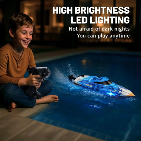 Child using remote to control High Speed Waterproof RC Boat With Water Cooling, 2.4 GHz Remote, Dual Batteries in pool at night
