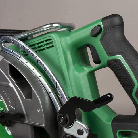 Close-up of 36V Cordless Circular Saw With Brushless Motor Rear Handle, showing ergonomic grip and part of the magnesium base.