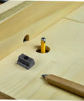 Heavy Duty 6 Piece T Slot Clamping Nuts Set Rock Solid High Strength T Nuts for T Slot Rails placed on wood with pencil.