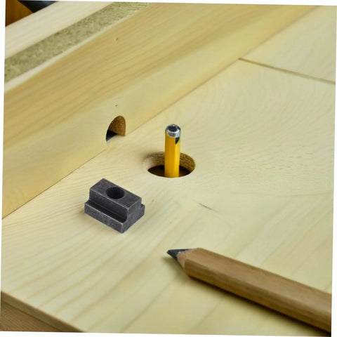 Heavy Duty 6 Piece T Slot Clamping Nuts Set Rock Solid High Strength T Nuts for T Slot Rails placed on wood with pencil.