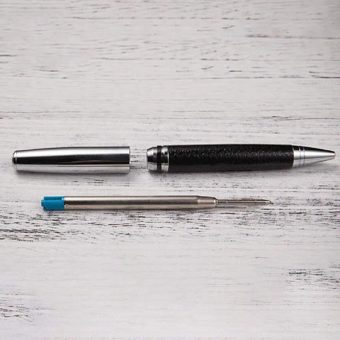 Rotary 0.5mm Ballpoint Pen Set with Leather Grip, Metal Body and Smooth Gel Ink, Refillable Refills displayed on desk
