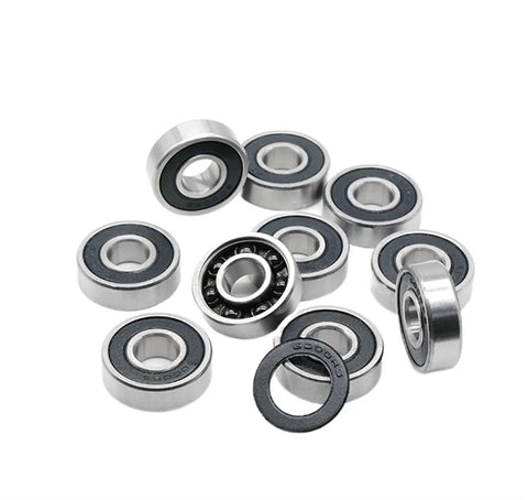 Top Tier Single Pack 6000 RS Deep Groove Ball Bearings 10mm X 26mm X 8mm Hybrid Steel Rings Ceramic Balls For Smooth Machine Runs arranged on a white background.