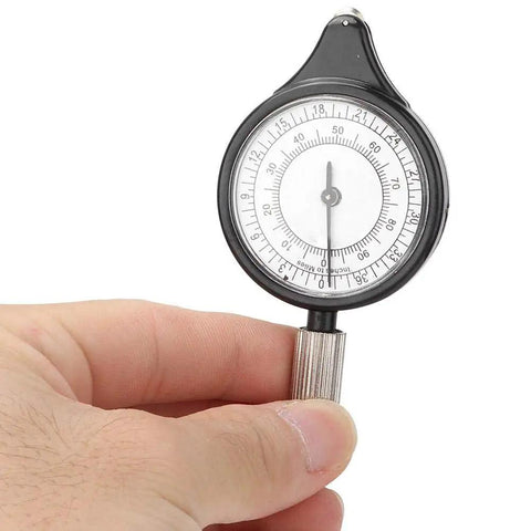 Wicked Compact Map Measure Wheel And Ridiculously Light Distance Calculator For Hiking Camping Trekking, compact compass in hand.