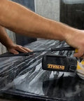 Person using orbital sander to polish stone countertop with Sanding Disc Variety Pack For Stone, Tile, And Countertops, 9 Round Abralon And Abranet