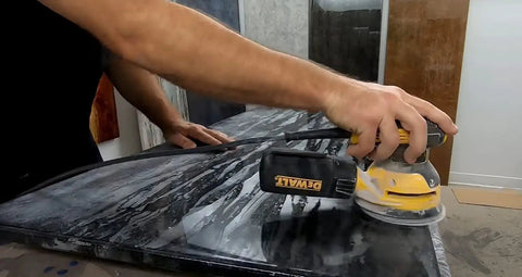 Person using orbital sander to polish stone countertop with Sanding Disc Variety Pack For Stone, Tile, And Countertops, 9 Round Abralon And Abranet