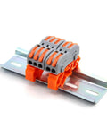 Compact Push In Terminal Block 222 Kit With Lever Operated Spring Clamp Tech Tools For Fast Wire Splicing On Solid And Stranded Copper From 28 To 12 AWG Plus Flame Retardant Transparent Housing With Test Points mounted on metal rail