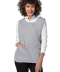 Heavy Duty Cobbler Apron Set Of Six With Deep Front Pockets And Adjustable Waist For Nurses Crafters And Mechanics Works Like A Champ Built Tough For The Daily Grind In Sharp Silver Gray worn by a smiling woman.