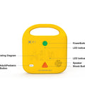 Yellow XFT AED trainer device front view with power button, LEDs, speaker, and CPR controls.